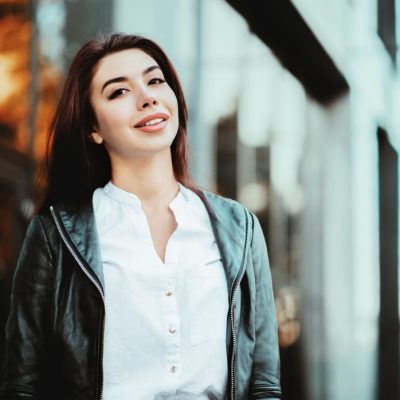 portrait-of-young-happy-business-woman-near-office-building-beautiful-caucasian-student-girl-in-white_t20_BlPVPj.jpeg